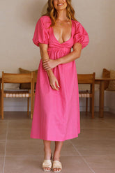 Kleid mit Cut-Out-Taille, V-Ausschnitt und Puffärmeln